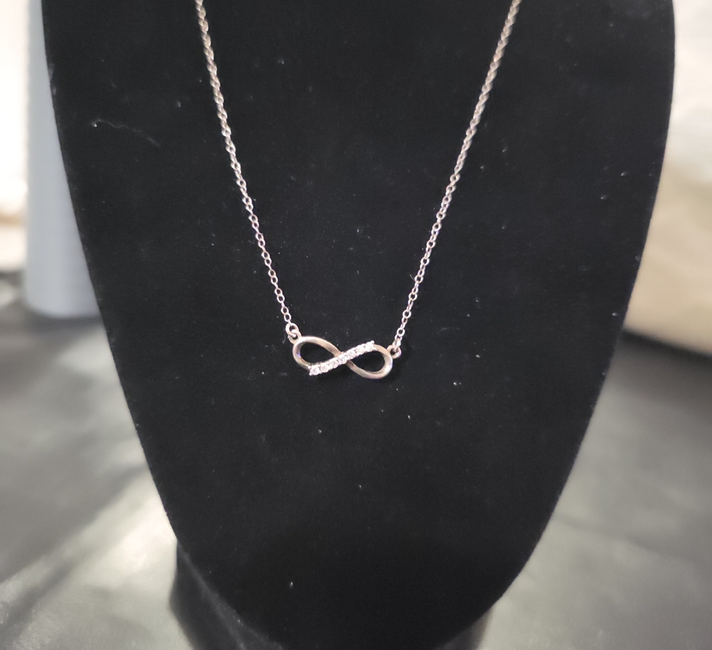 Infinity Pendant Necklace in Silver with Diamond Accents